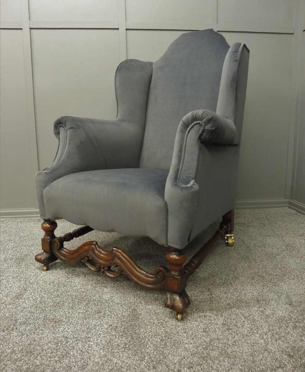 NEWLY UPHOLSTERED 19TH CENTURY WALNUT WING ARMCHAIR