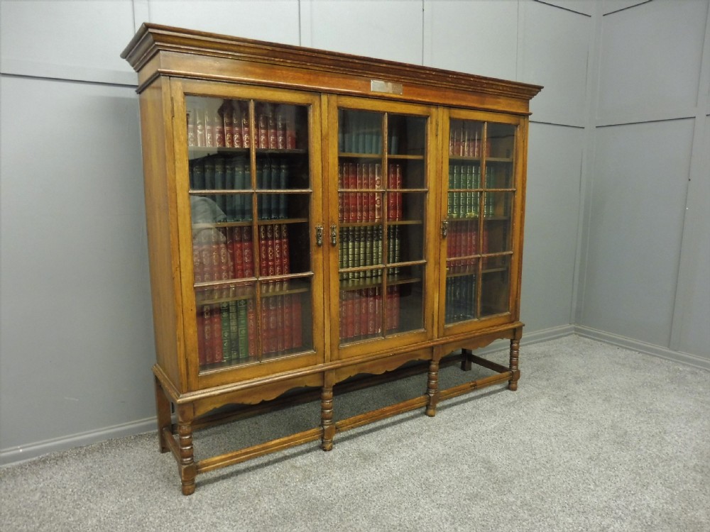OAK 3 DOOR BOOKCASE CIRCA 1923 View II