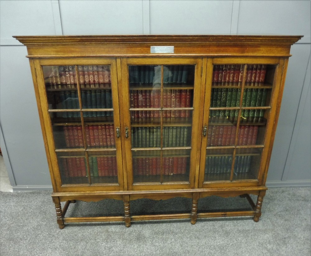 OAK 3 DOOR BOOKCASE CIRCA 1923 View III