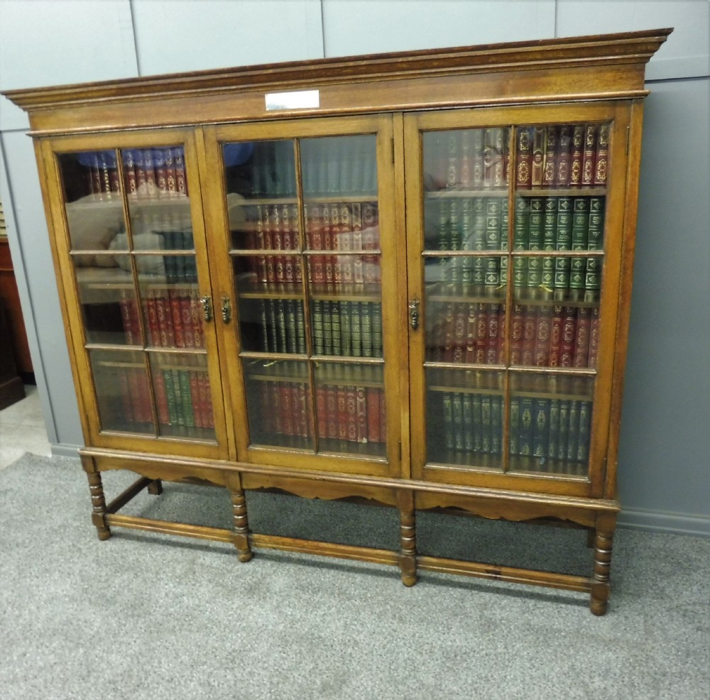 OAK 3 DOOR BOOKCASE CIRCA 1923 View IV