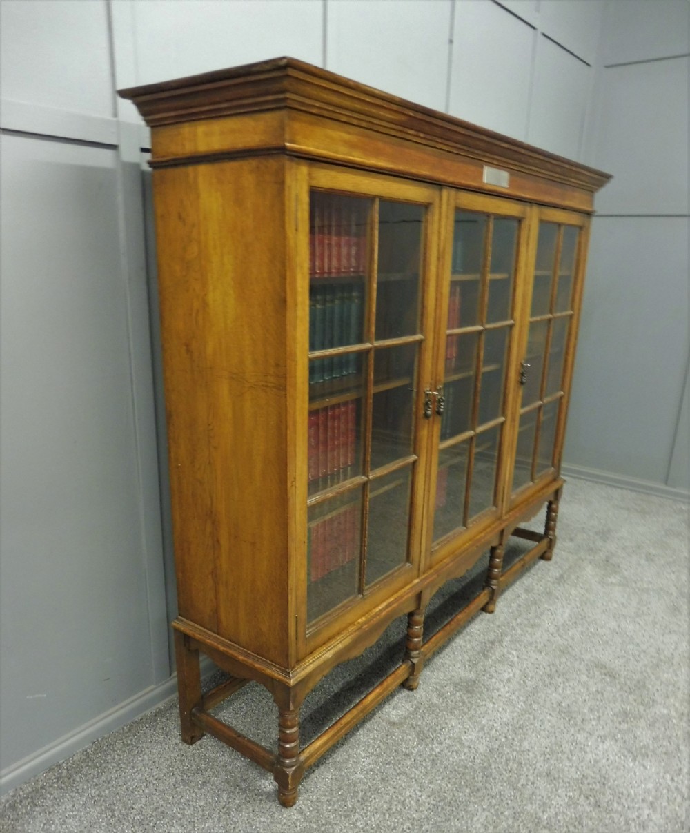 OAK 3 DOOR BOOKCASE CIRCA 1923 View VII