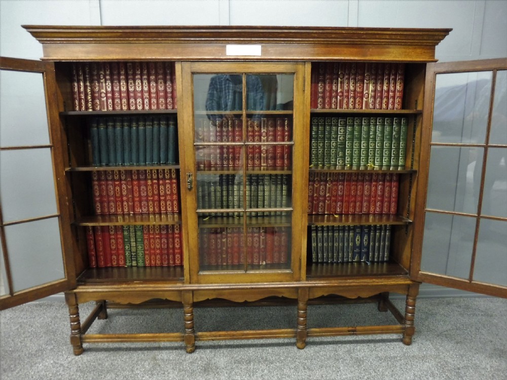 OAK 3 DOOR BOOKCASE CIRCA 1923 View X