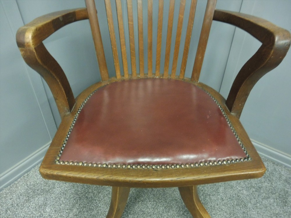 EDWARDIAN OAK AND LEATHER SWIVEL DESK ARM CHAIR View VII