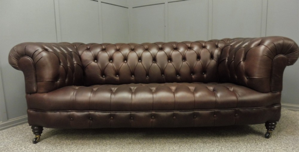 RESTORED AND REUPHOLSTERED LEATHER CHESTERFIELD SOFA View III