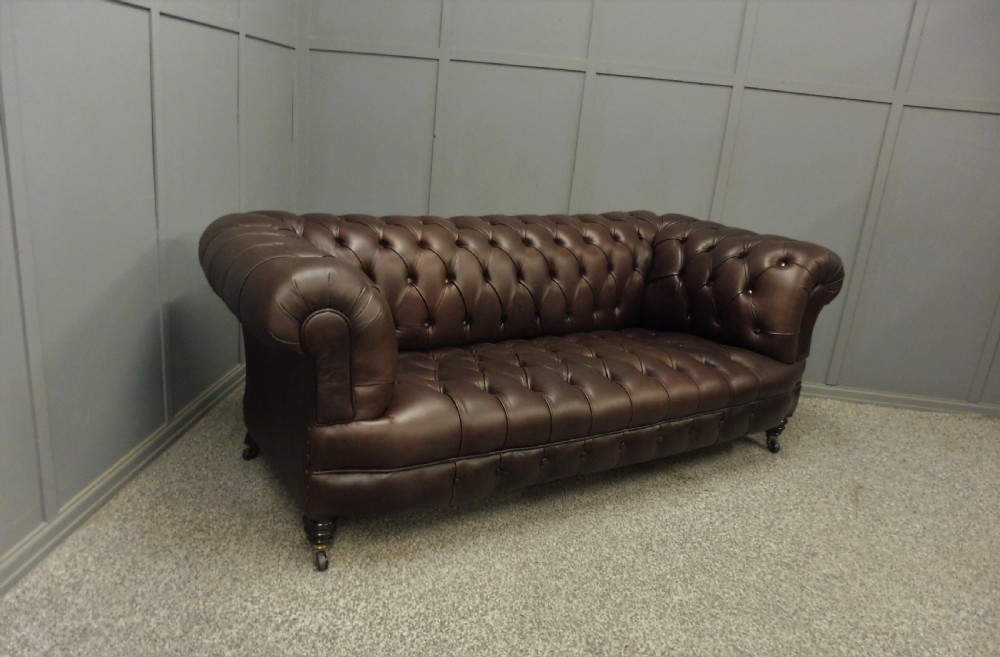 RESTORED AND REUPHOLSTERED LEATHER CHESTERFIELD SOFA View VIII