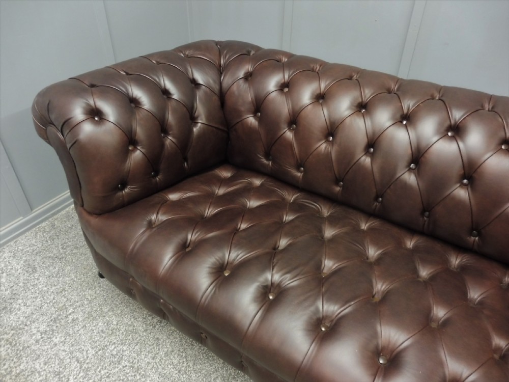 RESTORED AND REUPHOLSTERED LEATHER CHESTERFIELD SOFA View X