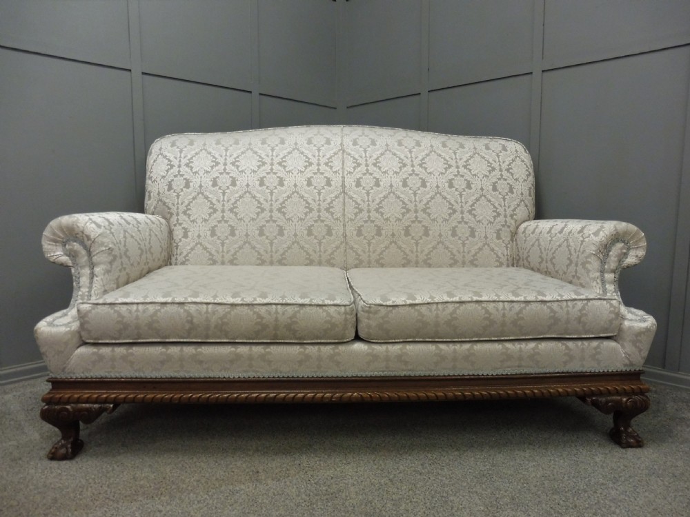 EDWARDIAN MAHOGANY BALL AND CLAW FOOT SOFA