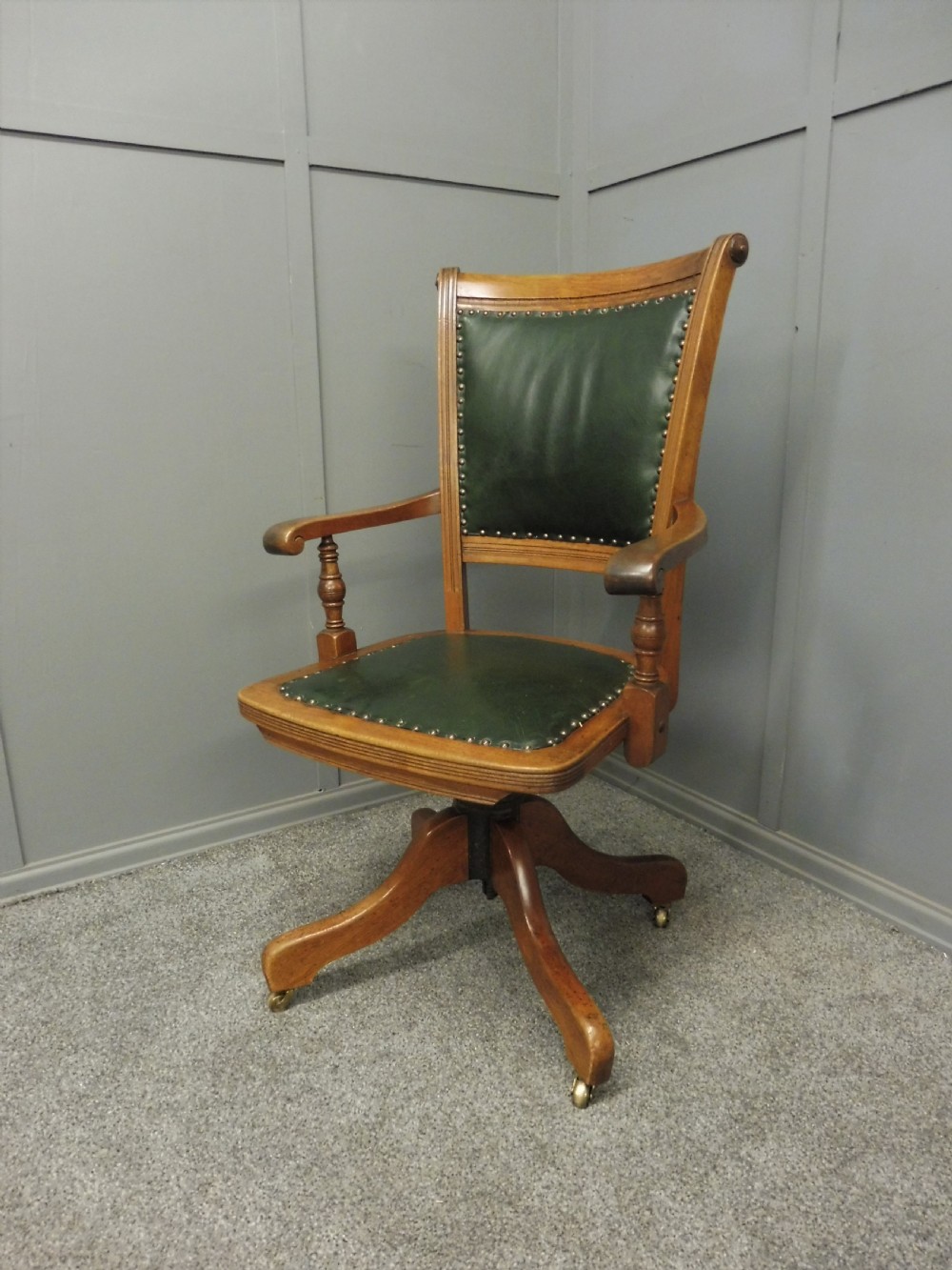 MAHOGANY AND LEATHER ANTIQUE OFFICE SWIVEL CHAIR