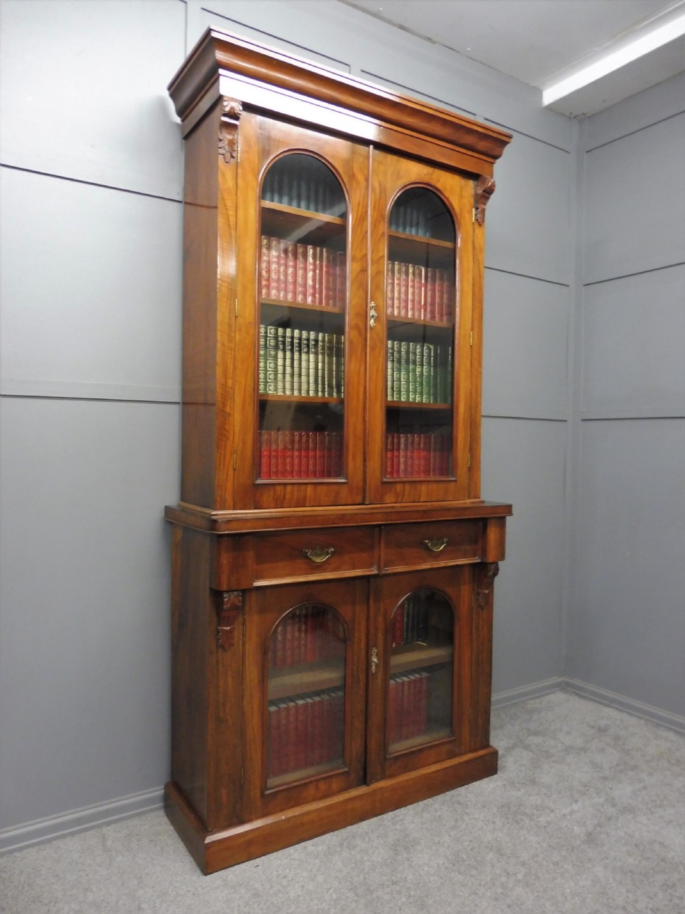 VICTORIAN FIGURED WALNUT BOOKCASE