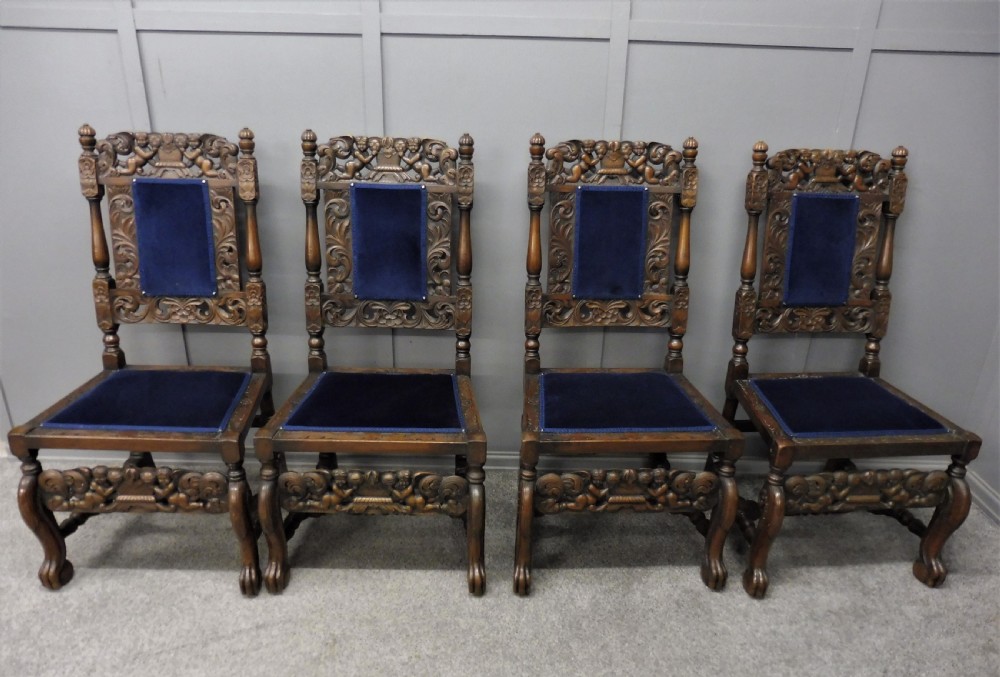 SET OF TEN CARVED WALNUT CHERUB DINING CHAIRS View VI