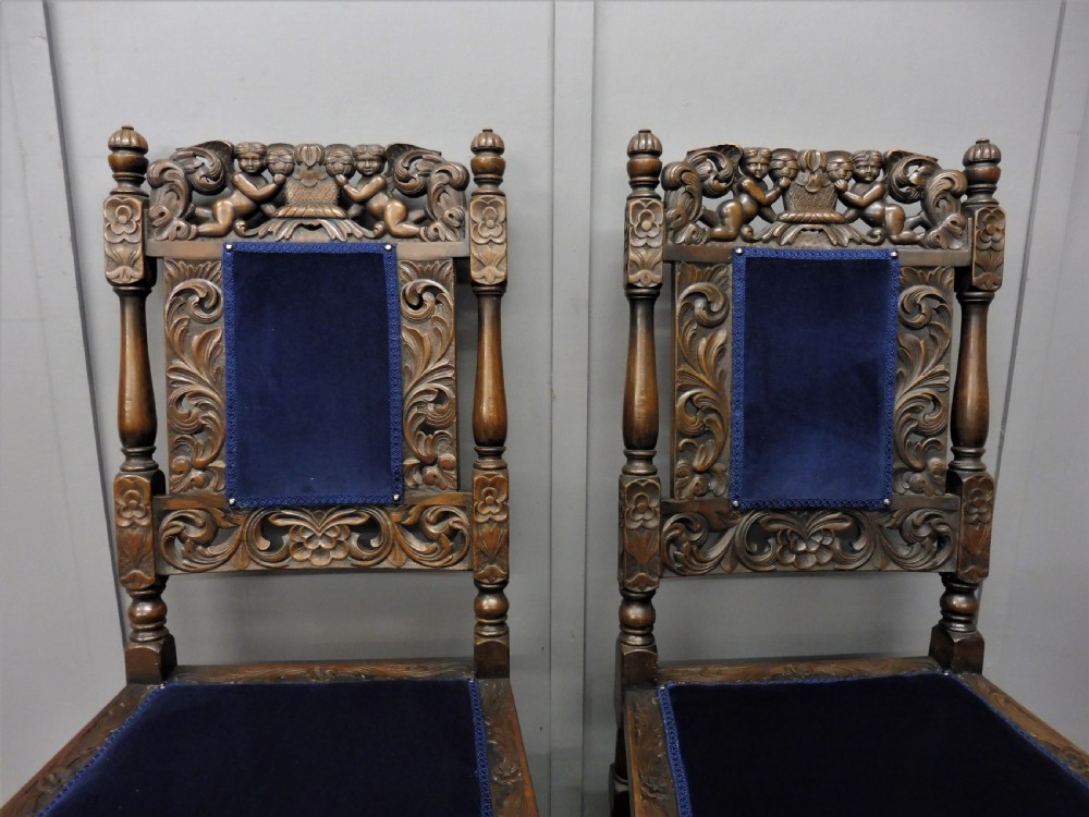 SET OF TEN CARVED WALNUT CHERUB DINING CHAIRS View VIII