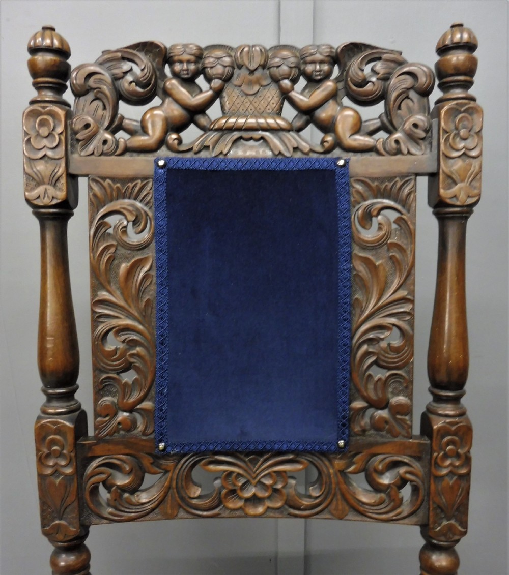 SET OF TEN CARVED WALNUT CHERUB DINING CHAIRS View X