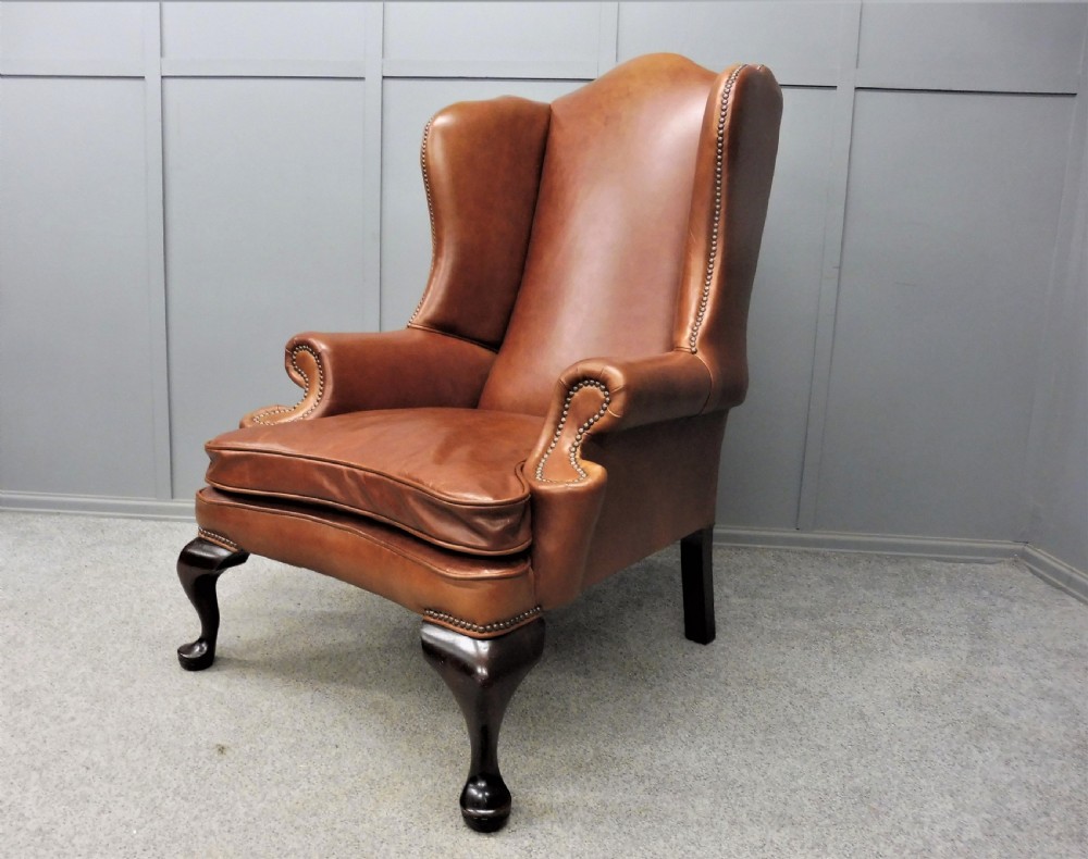LARGE LEATHER WING ARMCHAIR