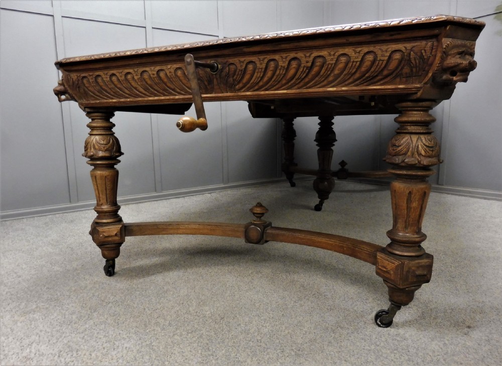 VICTORIAN CARVED OAK EXTENDING DINING TABLE CIRCA 1880 View III