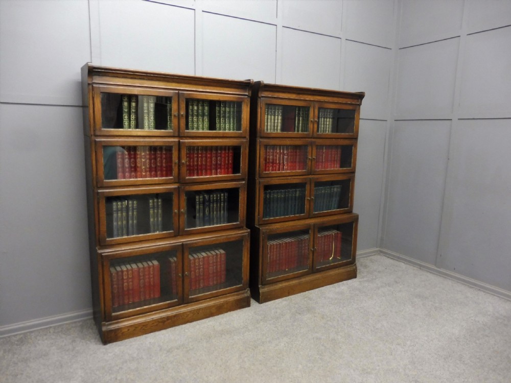 PAIR OF MINTY OF OXFORD OAK SECTIONAL STACKING BOOKCASES