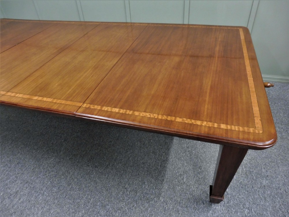 WALNUT INLAID EXTENDING DINING TABLE CIRCA 1900 View IV