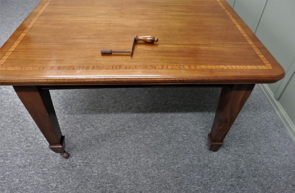 WALNUT INLAID EXTENDING DINING TABLE CIRCA 1900 View V