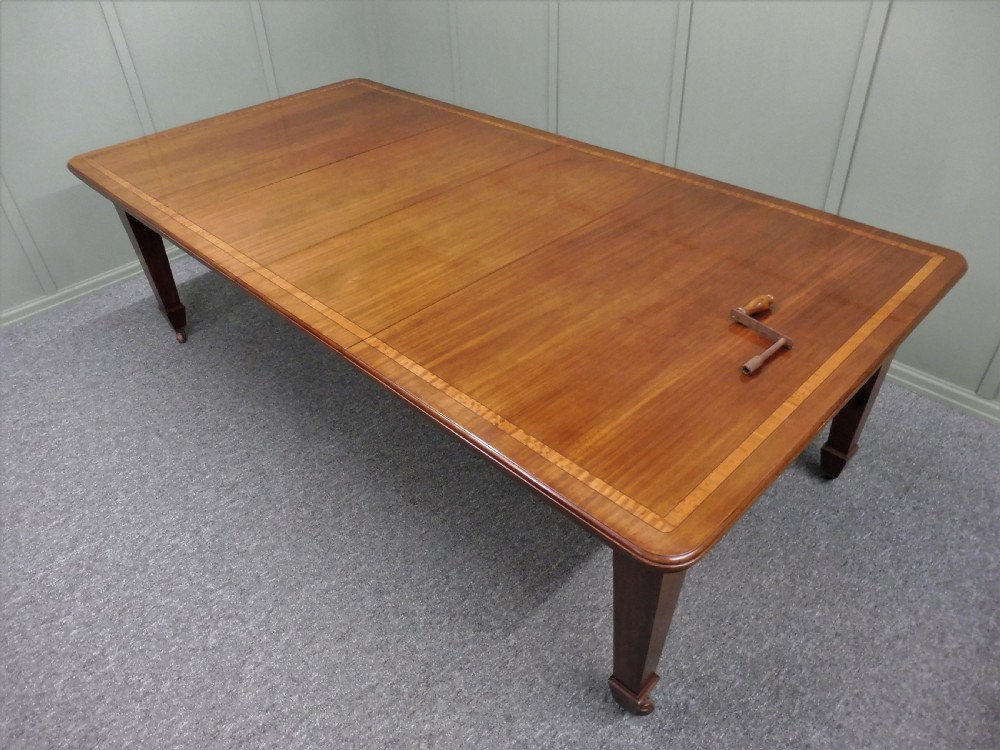WALNUT INLAID EXTENDING DINING TABLE CIRCA 1900 View IX