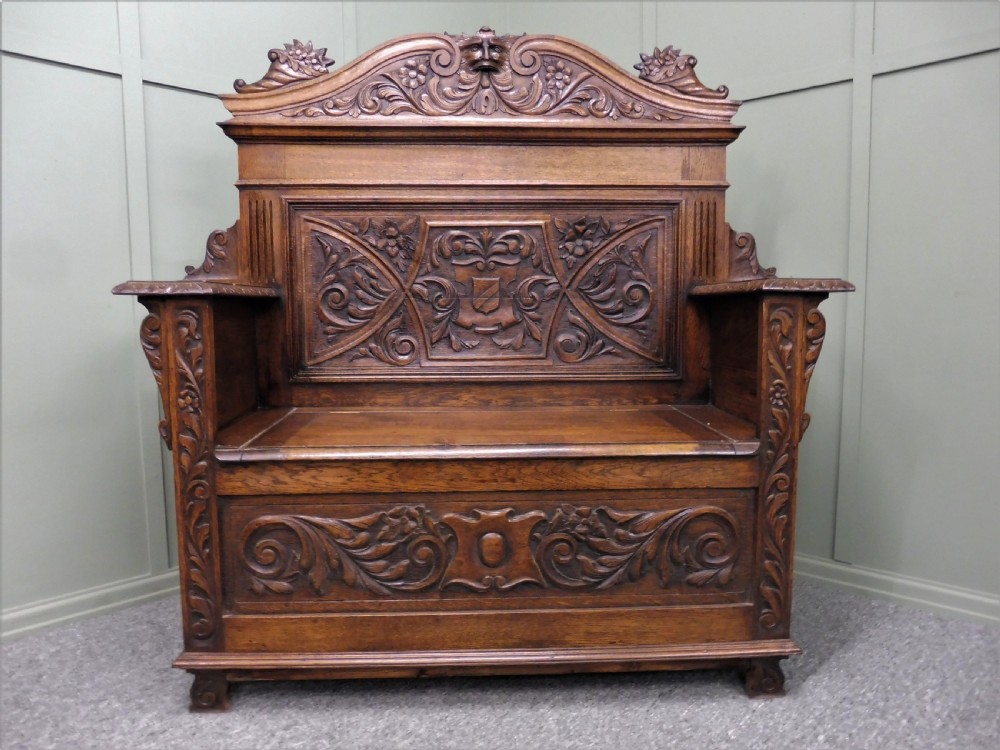 CARVED OAK GREEN MAN BENCH