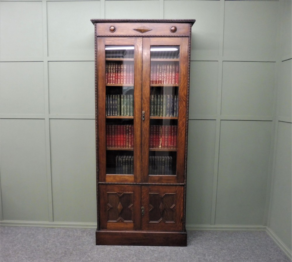 TALL SLIM OAK BOOKCASE