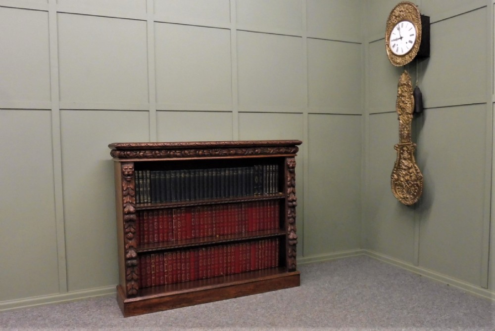 CARVED OAK LIONS HEAD BOOKCASE