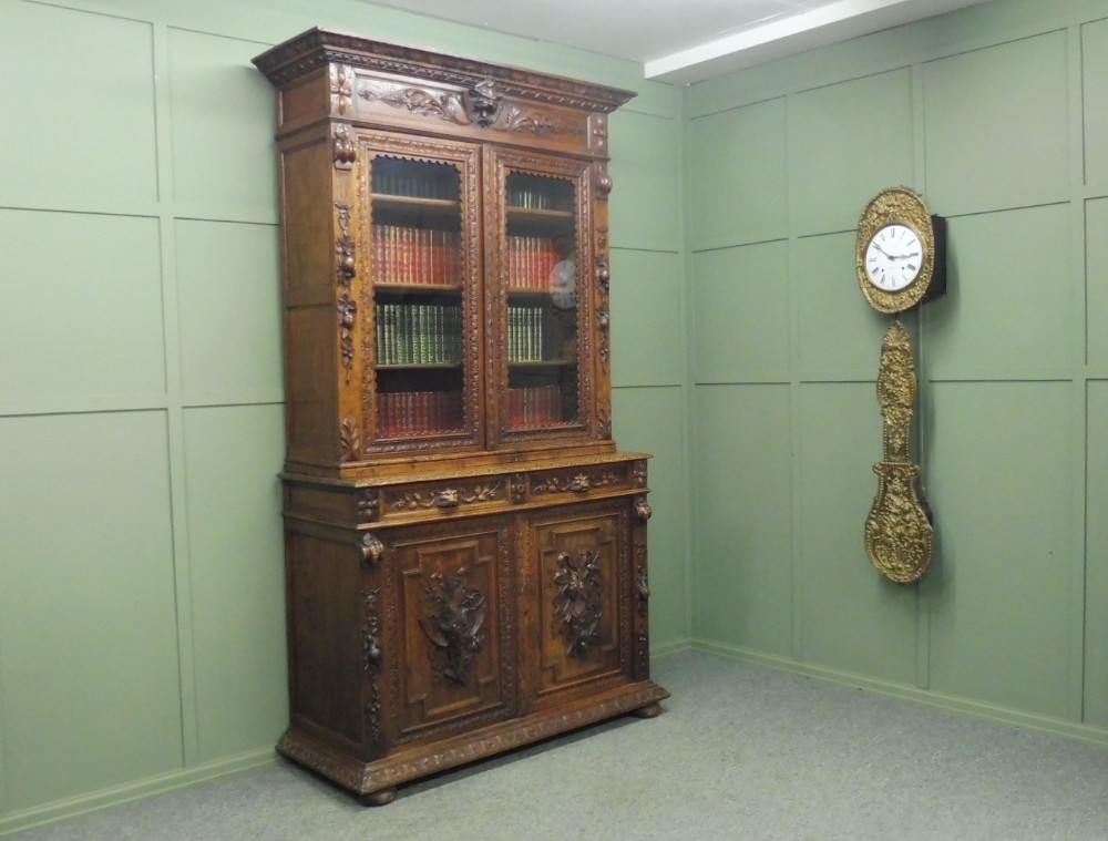 CARVED OAK HUNTING LODGE BOOKCASE