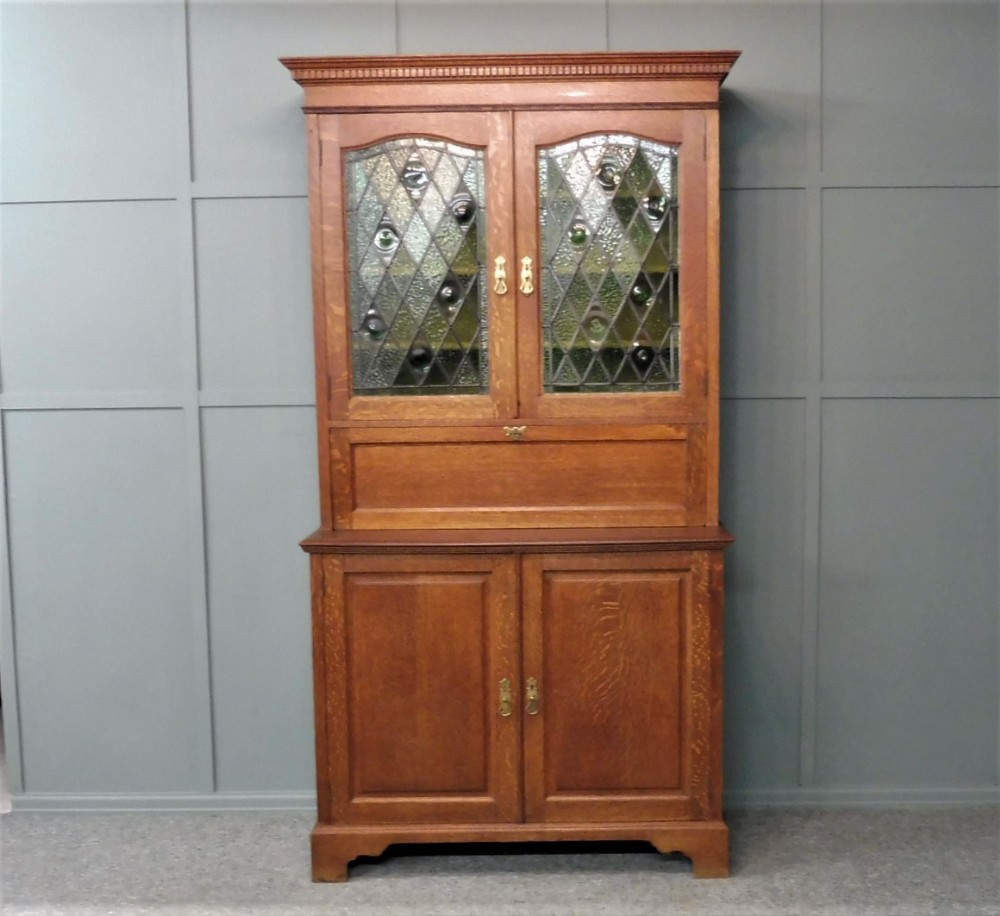 OAK ARTS AND CRAFTS BOOKCASE BY SHAPLAND AND PETTER CIRCA 1900