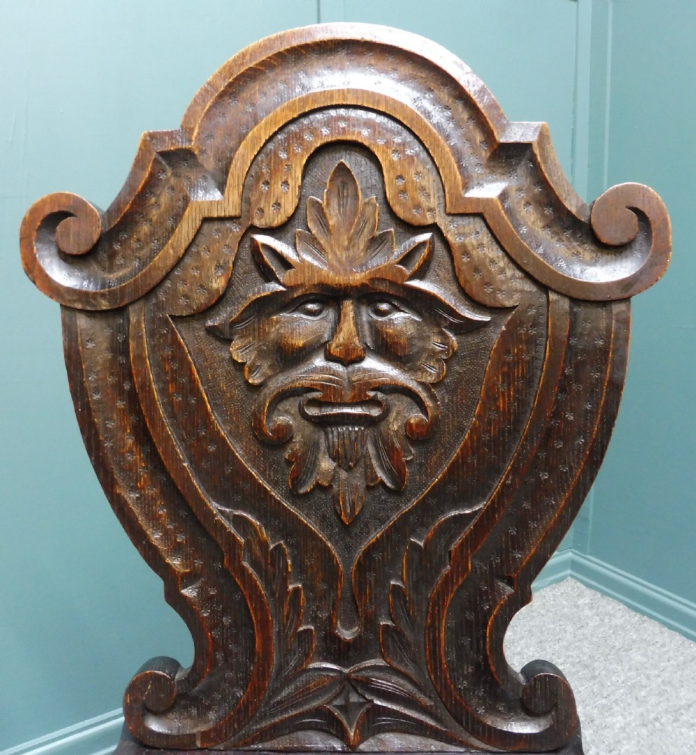 A PAIR OF 19TH CENTURY GREEN MAN HALL CHAIRS View VII