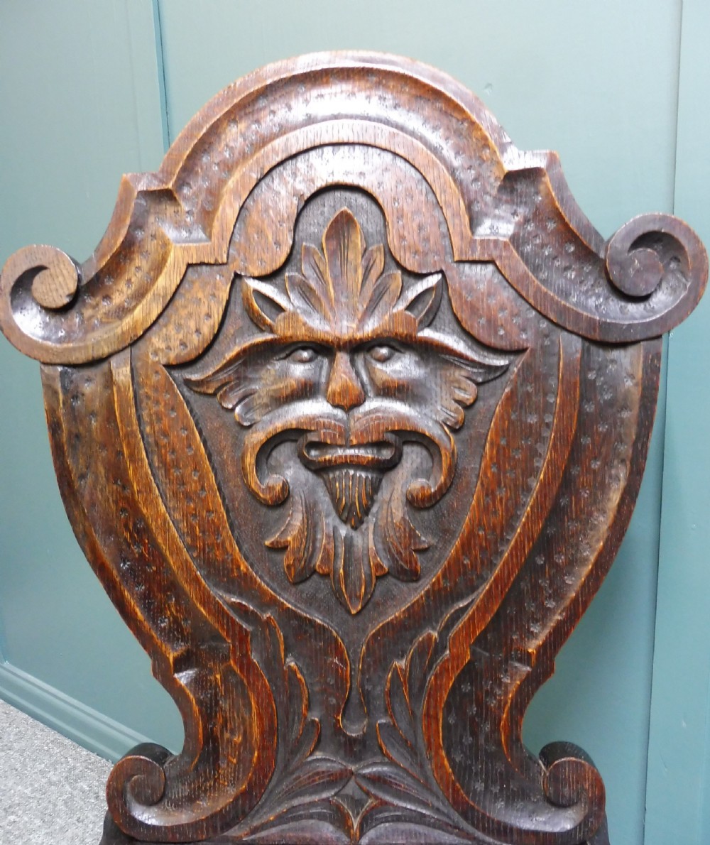 A PAIR OF 19TH CENTURY GREEN MAN HALL CHAIRS View VIII