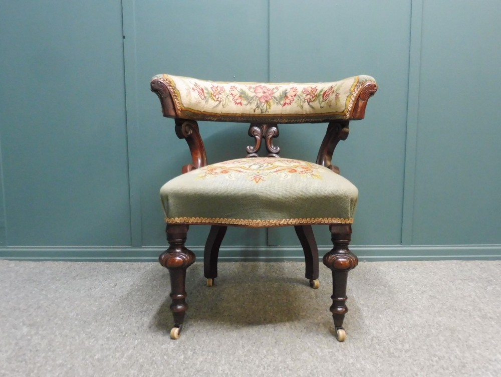 19th CENTURY HORSE SHOE ARMCHAIR