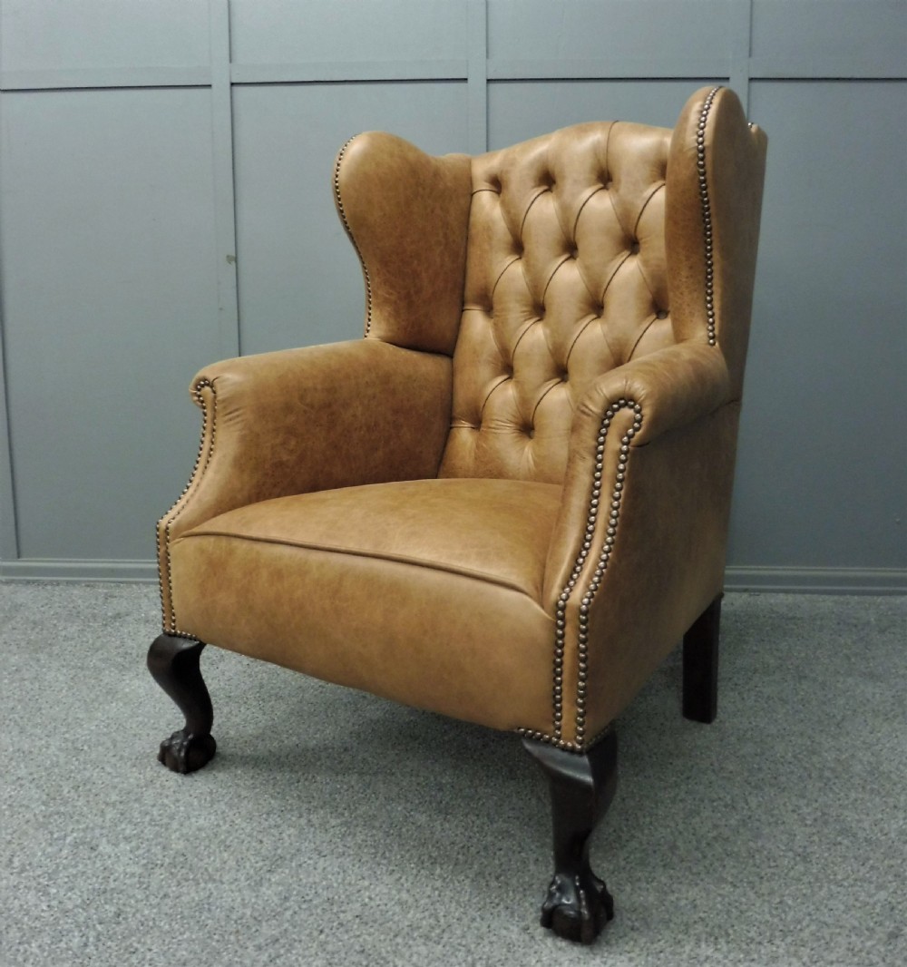 LEATHER WING ARMCHAIR CIRCA 1900
