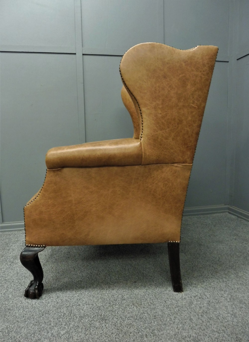 LEATHER WING ARMCHAIR CIRCA 1900 View V