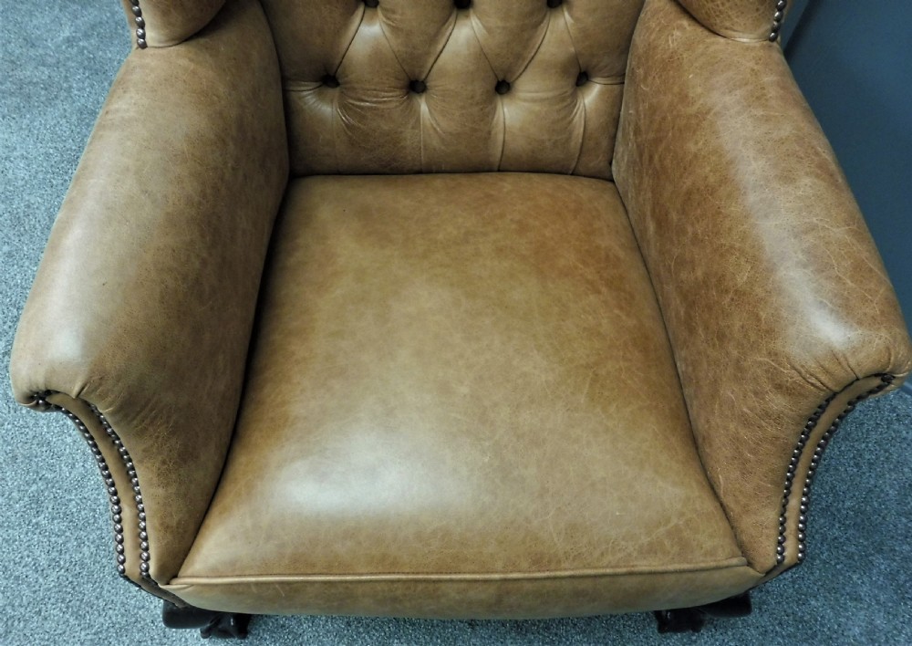 LEATHER WING ARMCHAIR CIRCA 1900 View X