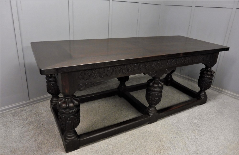 LARGE ELIZABETHAN STYLE DINING TABLE