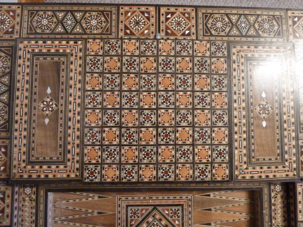 A Syrian Damascus card table featuring geometric wood and bone inlay work supported by curved cabriole legs. View XIII