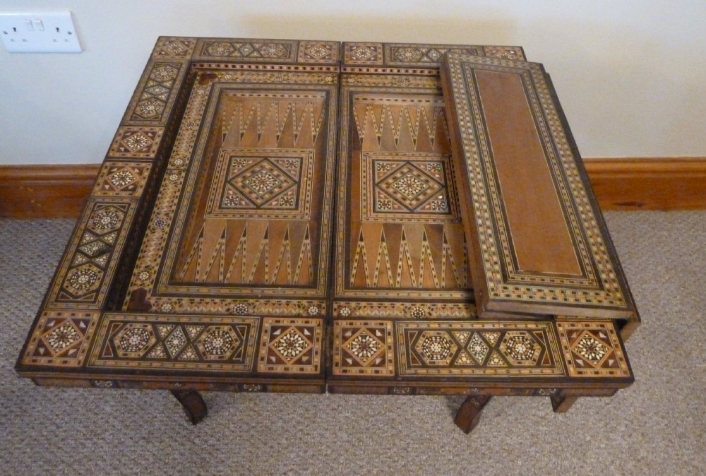 A Syrian Damascus card table featuring geometric wood and bone inlay work supported by curved cabriole legs. View XIV