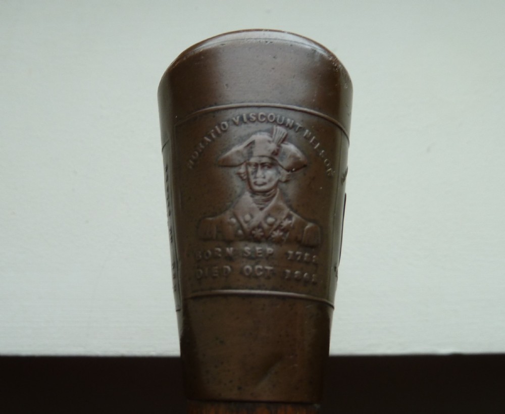 WALKING STICK AND COIN MADE FROM THE SALVAGED WRECK OF LORD NELSONS FIRST FLAGSIP THE FOUDROYANT View III