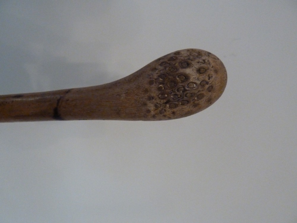 An antique bamboo swordstick shown partially unsheathed to reveal a concealed steel blade, featuring a natural bamboo handle and metal collar band. View XII