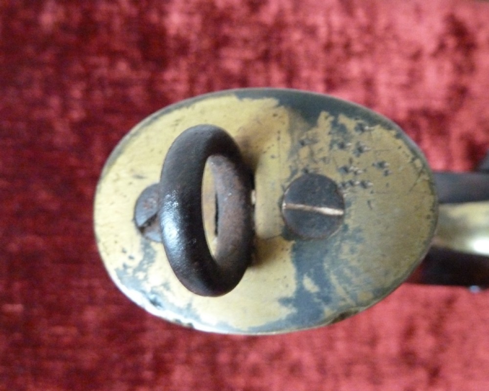 An antique 19th-century East India Company percussion pistol with a dark walnut stock, steel barrel and lock, brass trigger guard, and captive swivel ramrod. View VIII