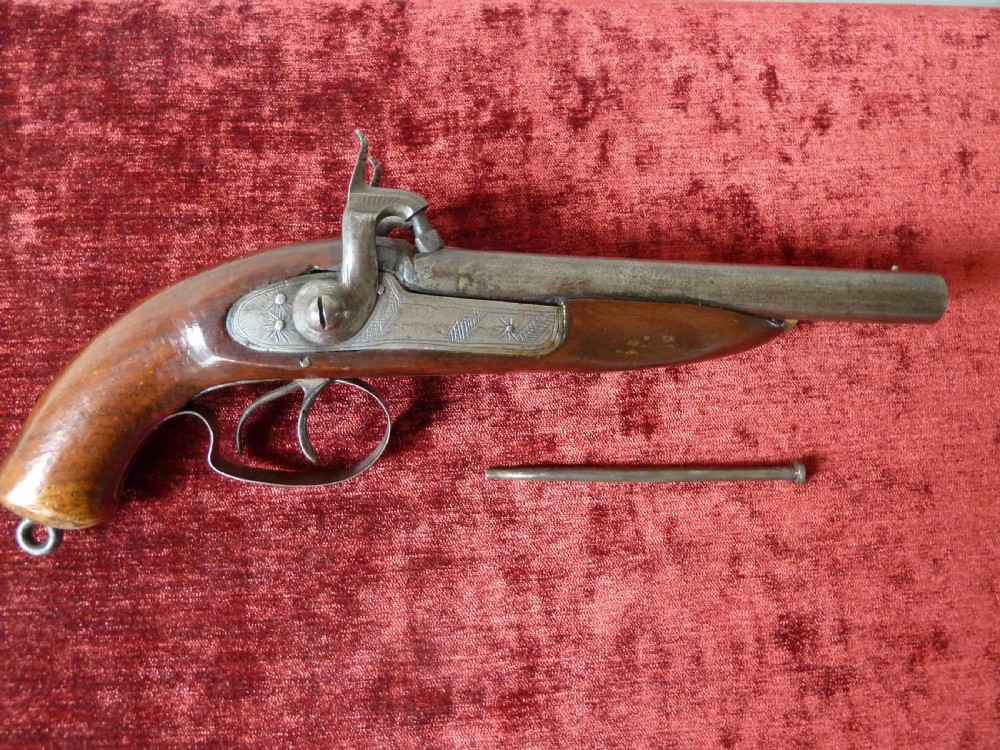 A 19th-century double-barrel percussion pistol featuring side-by-side steel barrels, dual hammers, engraved lockplates, and a smooth walnut stock. View XIII