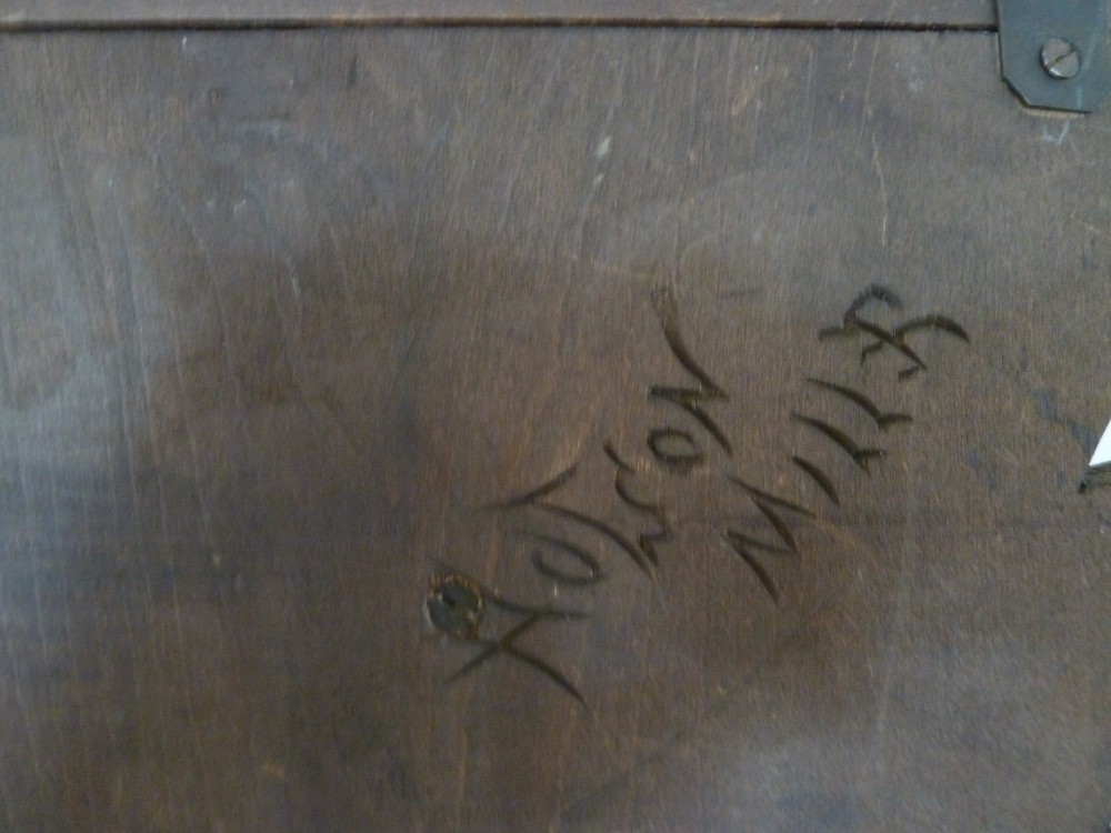 A dark brown hand-carved wooden wall bracket featuring a dog head surrounded by carved leaves below a small rounded shelf. View VII