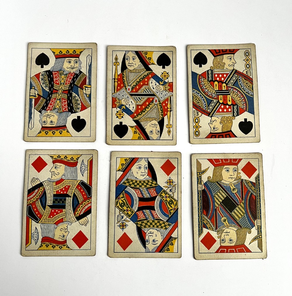A rectangular wooden Tunbridge Ware box lid featuring a central wood mosaic depicting a castle surrounded by geometric parquetry borders. View VI