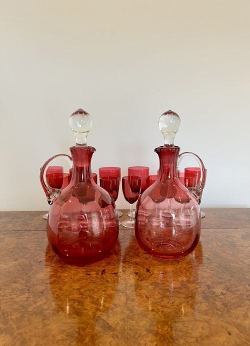 Pair of Quality Antique Victorian Cranberry Glass Decanters with Twelve Cranberry Glass Wine Glasses