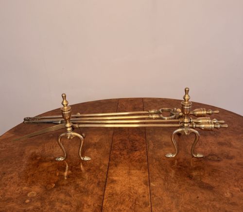 Fine quality antique Edwardian brass fire irons and fire dogs