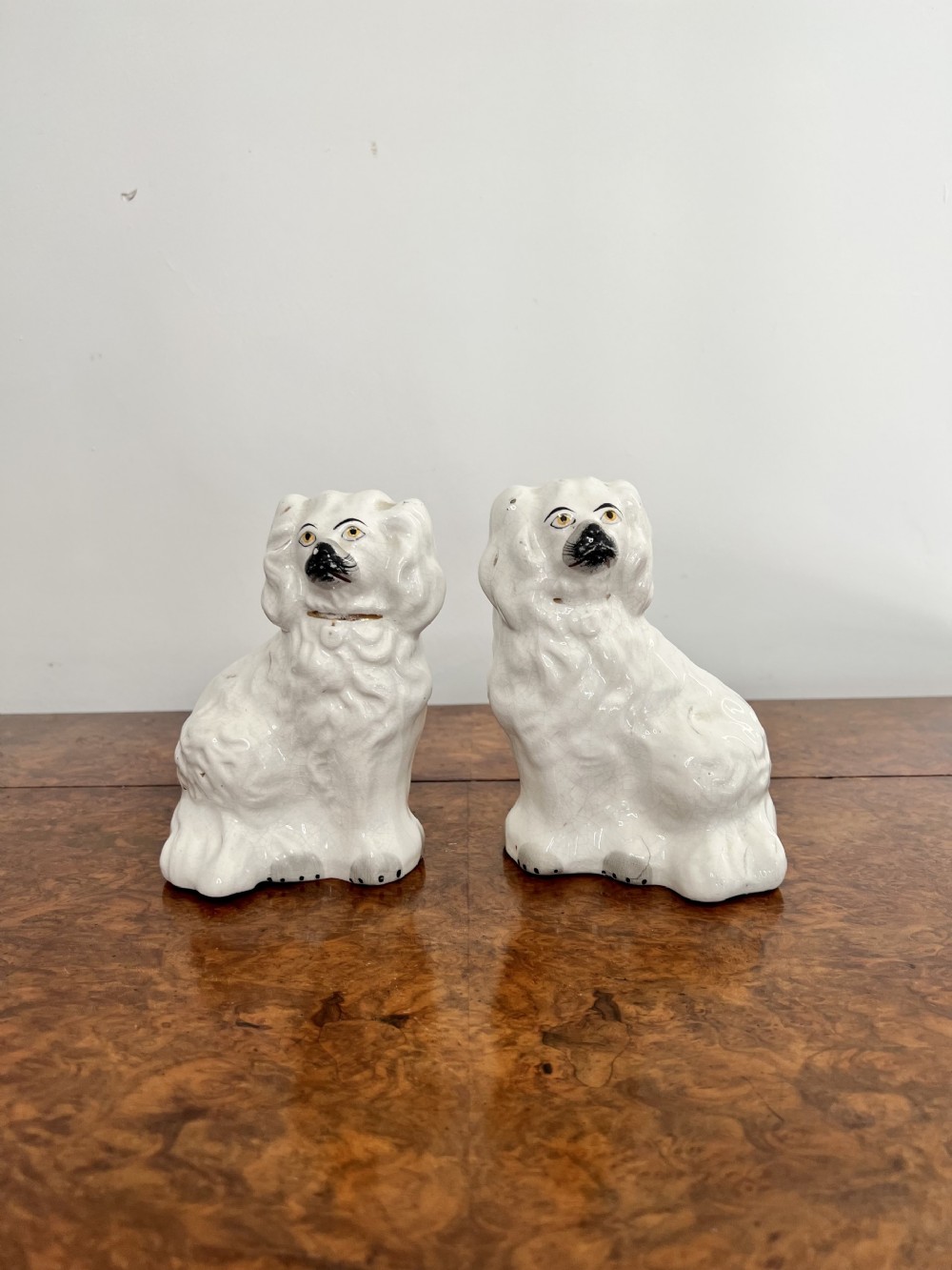 Pair of miniature antique Victorian Staffordshire dogs 