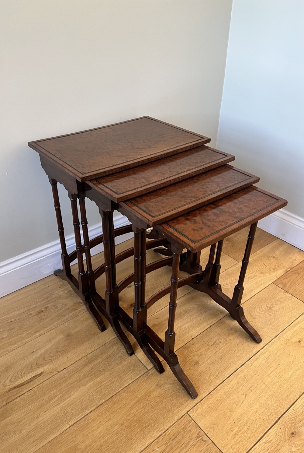 Outstanding quality antique Edwardian nest of four burr walnut tables 