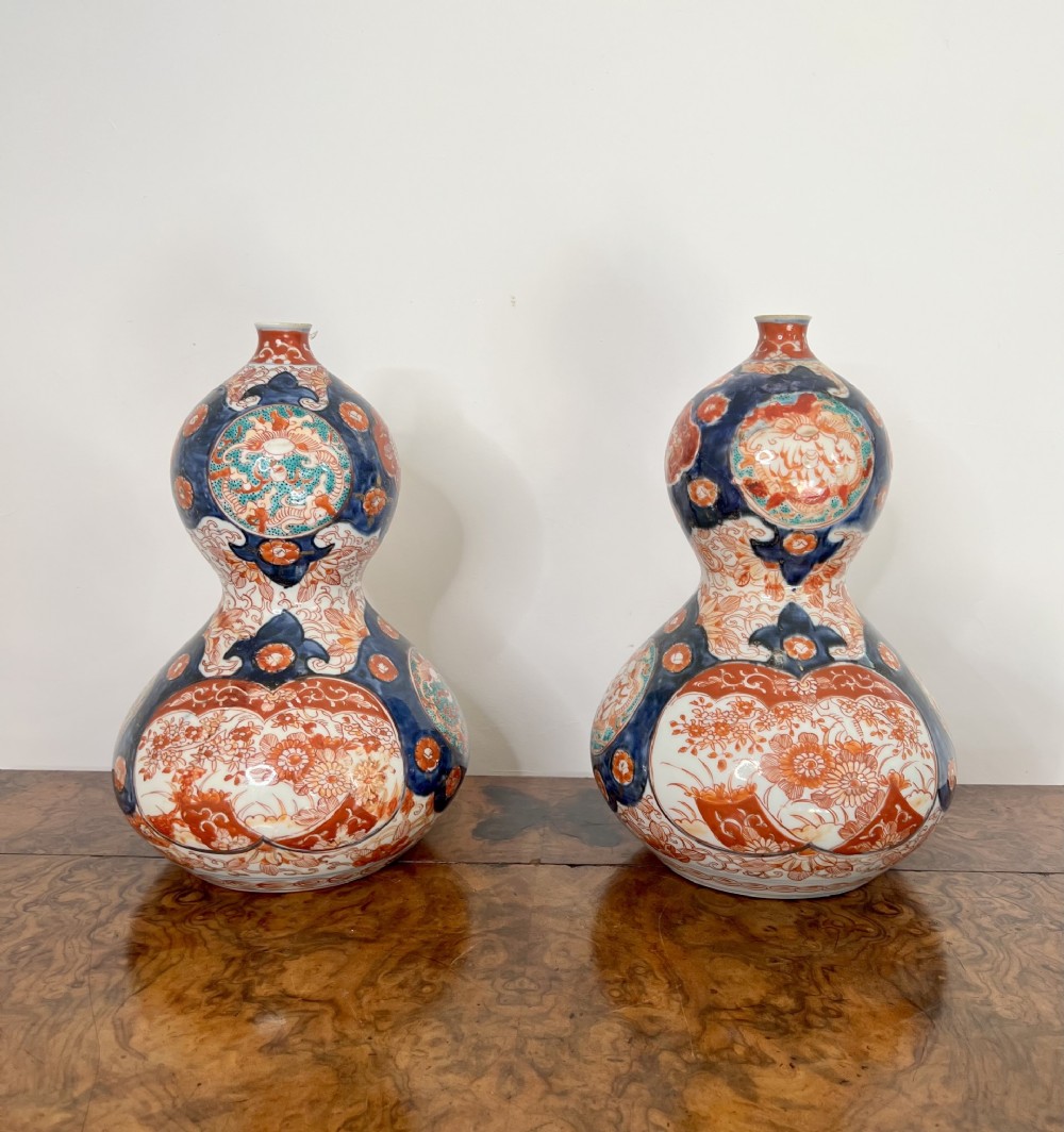Magnificent pair of unusual shaped antique Japanese imari vases