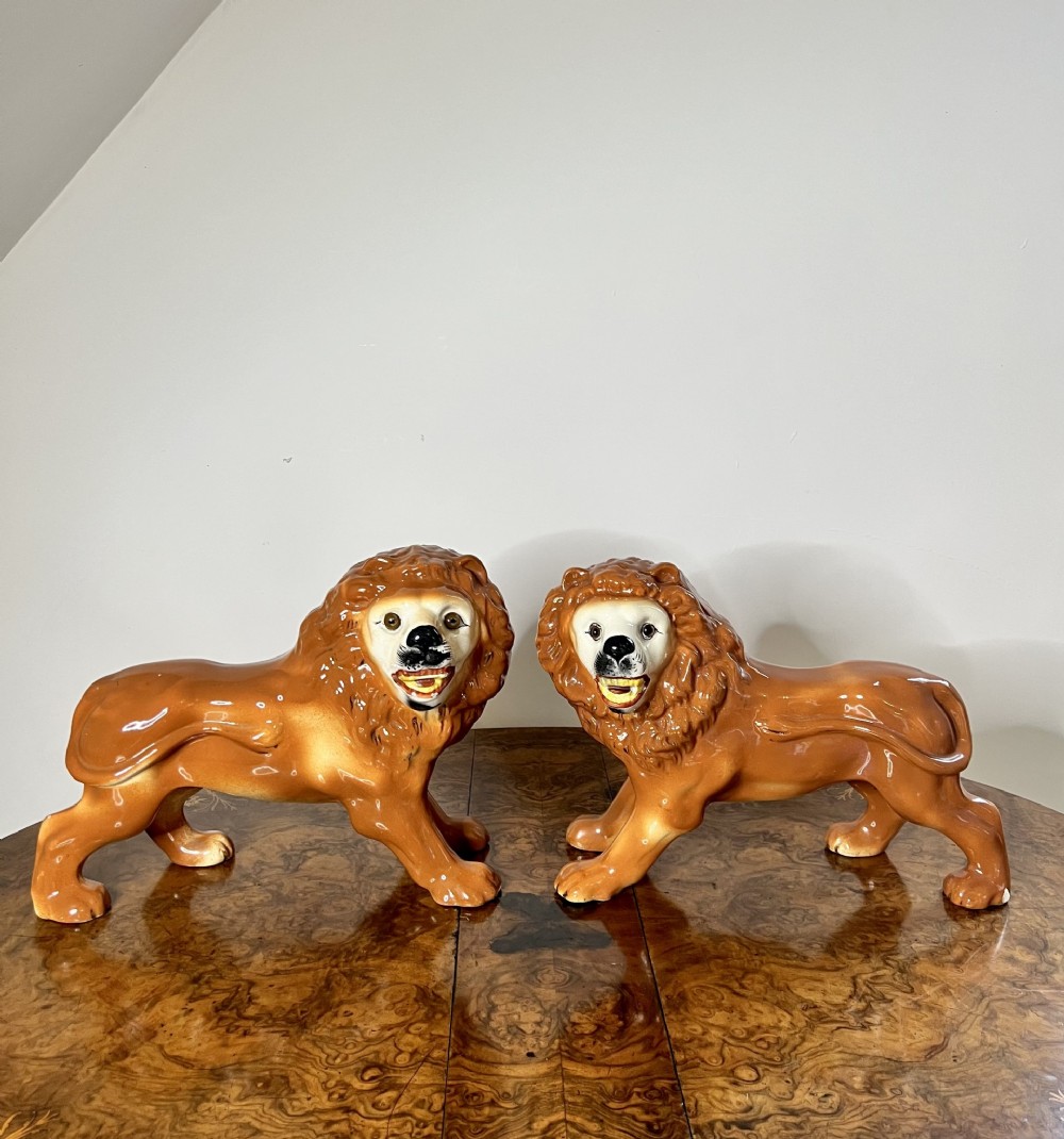 Large pair of antique Victorian Staffordshire lions 