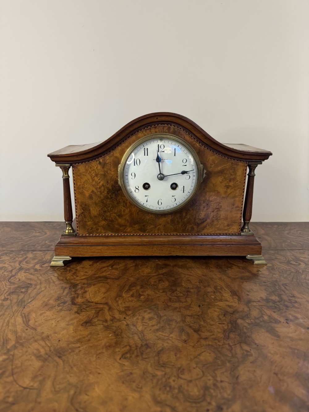 Quality antique burr walnut mantle clock by Kendal & Dent London