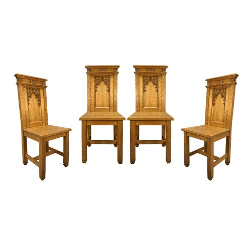 A Set of Four Gothic Hall Chairs in English Oak